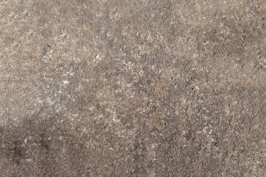 Çok eski bir beton duvar dekoratif veya desenli bir yüzeydir. Arkaplan olarak ya da tasarım amaçlı kullanılabilir