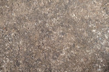 Çok eski bir beton duvar dekoratif veya desenli bir yüzeydir. Arkaplan olarak ya da tasarım amaçlı kullanılabilir