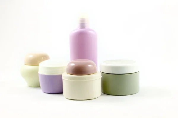 Containers of beauty products without labels — Stock Photo, Image