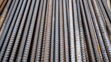 Çelik çubuklar ya da çubuklar binanın beton yapısında takviye çalışırlar. İnşaatta kullanılan çelik çubukların arka plan dokusu betonu güçlendirmek için kullanılır.