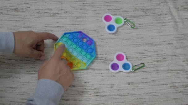 Person Hands Presses Bubbles Modern Silicone Toy Pop Stress Sensory — Stock Video