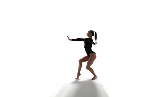 Žena Gymnastka Dělá Komplikovaný Trik Profesionální Aréně Royalty Free Stock Fotografie