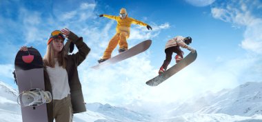Snowboard. Snowboard sürücüleri iş başında.