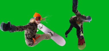 Snowboarding riders isolated on green screen.