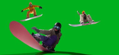 Snowboarding riders isolated on green screen.