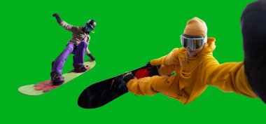 Snowboarding riders isolated on green screen.