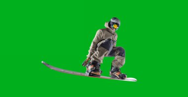 Snowboard sürücüsü yeşil ekranda izole edildi.