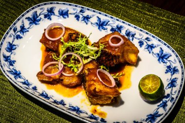 Peranakan gıda Ikan Masak Merah