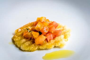 buchetta---- fresh tomatoes, a little lemon juice, olive oil, garlic, basil on crispy bread