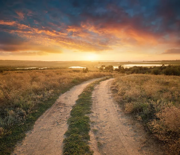 Rural road on mountain hill — Stock Photo, Image