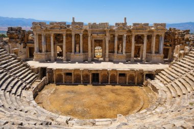 Hierapolis, Pammukale, Turkey. Ancient amphitheater. Panoramic landscape in the daytime. UNESCO Heritage Site. Historic Site. A vacation and tourism destination. clipart