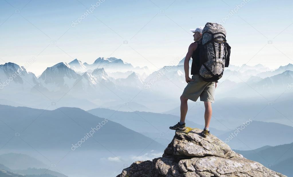 man in Hill during sunrise in mountain