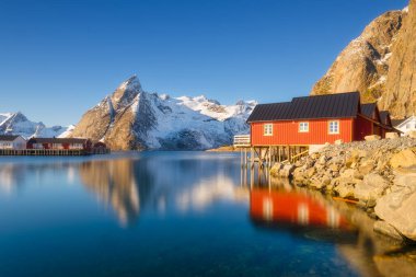 Panoramic view of the Lofoten Islands, Norway. Natural winter landscape. Picturesque view of traditional Norwegian fishermen's houses. Wide panoramic view. Postcards, backgrounds, wallpapers.