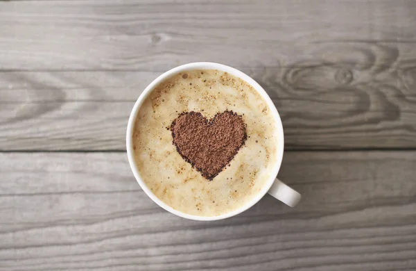 Heart from chocolate on coffee — Stock Photo, Image