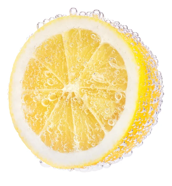 Lemons and water splash — Stock Photo, Image