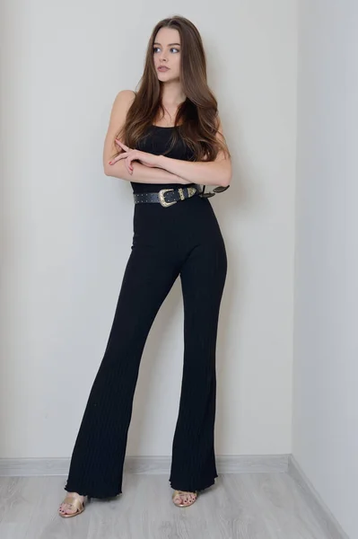 Young Woman Black Flared Trousers Black Top Woman Staying Home — Stock Fotó