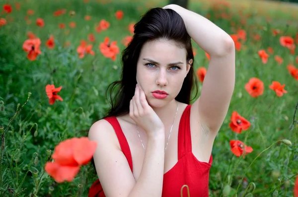 Brunette with flowers — Stock Photo, Image