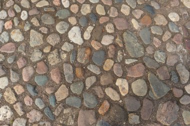 Çok renkli taşların dokusundan antik kaldırım taşları