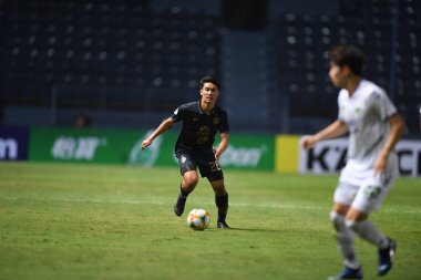 Buriram, Tayland-Mar13,2019: Ratthanakorn maikami gömülü defin oyuncusu AFC2019 sırasında Jeonbuk hyundai 'ye karşı defin rampası arasında çarpışma halinde birleşti.