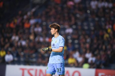 Buriram, Tayland-Mar13,2019: Buriram Stadyumu 'nda Jeonbuk Hyundai' nin Jeonbuk Hyundai 'ye karşı defnedildiği AFC2019' da Song bumkeun # 31 oyuncusuydu.