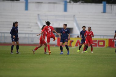Bangkok-Tayland-17 Ağustos 2019: Tayland Beden Eğitimi Enstitüsü Chonburi, Tayland 'da AFF ve 8-0 Singapur arasında görev yapan 14 numaralı Tayland oyuncusu Irravadee Makris