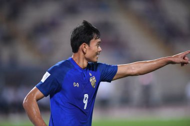 Bangkok-Tayland-9NOV2018: Tayland milli stadyumundaki Timor leste ile Tayland arasındaki AFF Suzuki Kupası 2018 'de Adisak kraisorn oyuncusu gol için kutlama yaptı