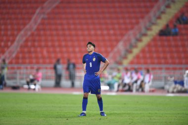 Bangkok-Tayland-9NOV2018: Tayland milli stadyumunda Timor leste ile Tayland arasındaki AFF Suzuki Kupası 2018 maçında Tayland 'ın Thitipan phungjan oyuncusu eylemde