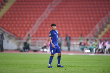 Bangkok-Tayland-9NOV2018: Tayland milli stadyumunda Timor leste ile Tayland arasındaki AFF Suzuki Kupası 2018 maçında Tayland 'ın Thitipan phungjan oyuncusu eylemde