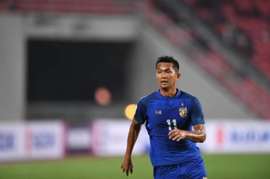 Bangkok-Tayland-9NOV2018: Tayland milli stadyumu Timor Leste karşısında Tayland AFF Suzuki Kupası 2018 'de Mongkol Tossakai oynuyordu
