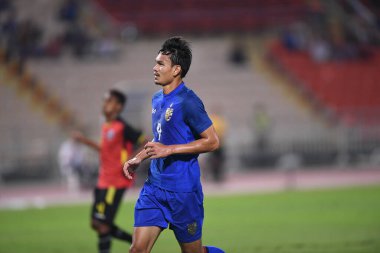 Bangkok-Tayland-9NOV2018: Tayland milli stadyumunda Timor leste ile Tayland arasındaki AFF Suzuki Kupası 2018 'de Adisak kraisorn oyuncusu eylemde