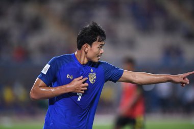 Bangkok-Tayland-9NOV2018: Tayland milli stadyumundaki Timor leste ile Tayland arasındaki AFF Suzuki Kupası 2018 'de Adisak kraisorn oyuncusu gol için kutlama yaptı