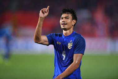 Bangkok-Tayland-9NOV2018: Tayland milli stadyumundaki Timor leste ile Tayland arasındaki AFF Suzuki Kupası 2018 'de Adisak kraisorn oyuncusu gol için kutlama yaptı