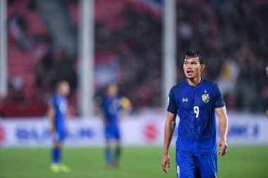 Bangkok-Tayland-9NOV2018: Tayland milli stadyumunda Timor leste ile Tayland arasındaki AFF Suzuki Kupası 2018 'de Adisak kraisorn oyuncusu eylemde