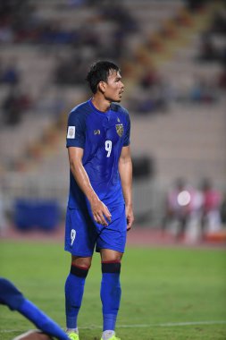 Bangkok-Tayland-9NOV2018: Tayland milli stadyumunda Timor leste ile Tayland arasındaki AFF Suzuki Kupası 2018 'de Adisak kraisorn oyuncusu eylemde