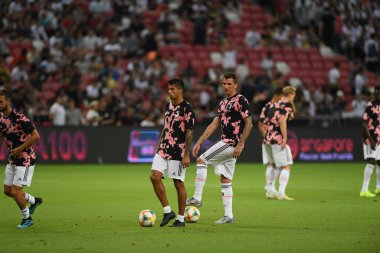 Kallang, Singapur - 21 Temmuz 2019: Juventus 'un oyuncusu, Juventus ve Spur arasında Singapur' daki ulusal stadyumda 2019 yılındaki eylemde.