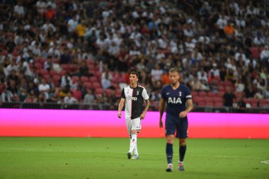 Kallang, Singapur - 21 Temmuz 2019: Juventus 'un oyuncusu, Juventus ve Spur arasında Singapur' daki ulusal stadyumda 2019 yılındaki eylemde.