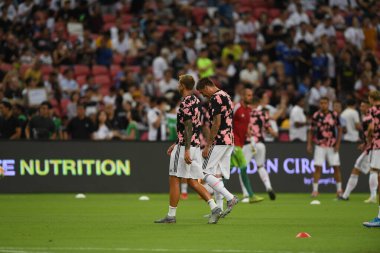 Kallang, Singapur - 21 Temmuz 2019: Juventus 'un oyuncusu, Juventus ve Spur arasında Singapur' daki ulusal stadyumda 2019 yılındaki eylemde.