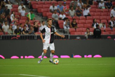 Kallang, Singapur - 21 Temmuz 2019: Juventus 'un oyuncusu, Juventus ve Spur arasında Singapur' daki ulusal stadyumda 2019 yılındaki eylemde.