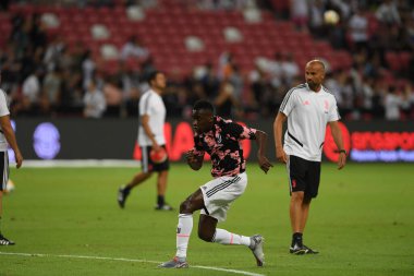 Kallang, Singapur - 21 Temmuz 2019: Juventus 'un oyuncusu, Juventus ve Spur arasında Singapur' daki ulusal stadyumda 2019 yılındaki eylemde.