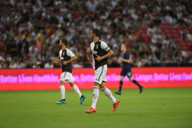 Kallang, Singapur - 21 Temmuz 2019: Juventus 'un oyuncusu, Juventus ve Spur arasında Singapur' daki ulusal stadyumda 2019 yılındaki eylemde.