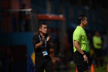 Bangkok-Thailand- 13 Jul 2019:Sasom popprasert head coach of Chonburi fc in action during thaileague match between port fc against Chonburi fc at pat stadium, Thailand