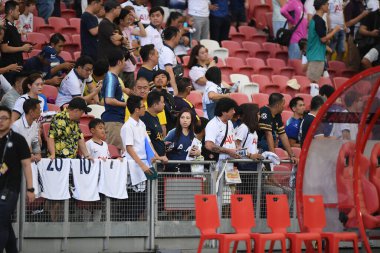 Kallang-singapore-19jul2019-Unidentified fan of tottenham hotspur in action during official training before icc2019 at national stadium,singapore