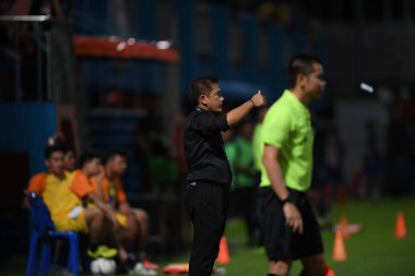 Bangkok-Thailand- 13 Jul 2019:Sasom popprasert head coach of Chonburi fc in action during thaileague match between port fc against Chonburi fc at pat stadium, Thailand
