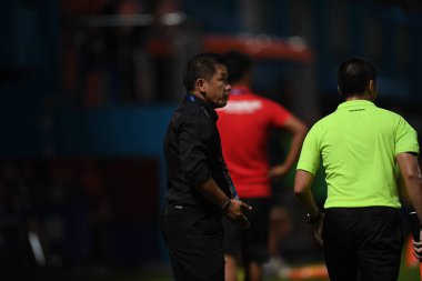 Bangkok-Thailand- 13 Jul 2019:Sasom popprasert head coach of Chonburi fc in action during thaileague match between port fc against Chonburi fc at pat stadium, Thailand