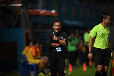 Bangkok-Thailand- 13 Jul 2019:Sasom popprasert head coach of Chonburi fc in action during thaileague match between port fc against Chonburi fc at pat stadium, Thailand