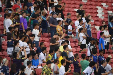 Kallang-singapore-19jul2019-Unidentified fan of tottenham hotspur in action during official training before icc2019 at national stadium,singapore
