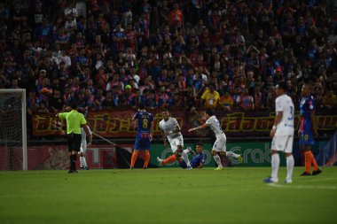 Bangkok-Thailand-13 Jul 2019: Herlison caion de souza ferreira player of Chonburi fc congratulation for goal during thaileague match between port fc against Chonburi fc at pat stadium, Thailand
