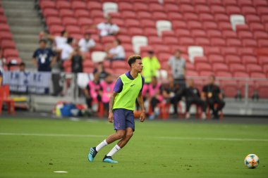 Kallang-singapore-19jul2019-Dele alli player of tottenham hotspur in action during official training before icc2019 at national stadium,singapore