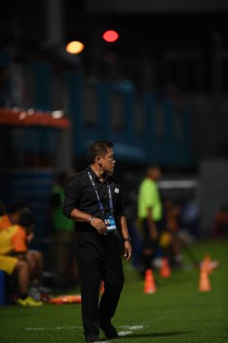 Bangkok-Thailand- 13 Jul 2019:Sasom popprasert head coach of Chonburi fc in action during thaileague match between port fc against Chonburi fc at pat stadium, Thailand