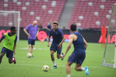 Kallang-singapore-19jul2019-Dele alli player of tottenham hotspur in action during official training before icc2019 at national stadium,singapore
